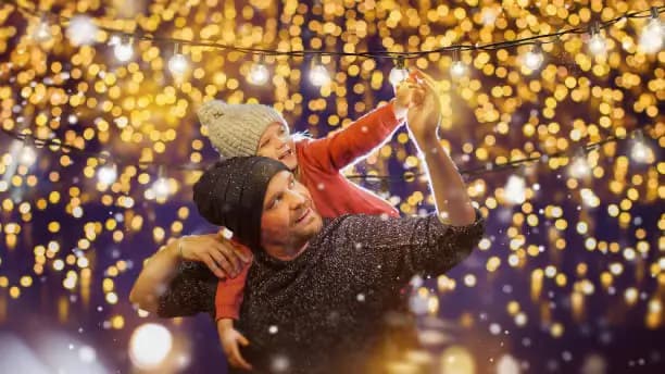 Father and child with Christmas lights in Pigeon Forge